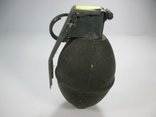 t-3 Military Surplus inert hand grenade. Holed at bottom so can't be used but is a great display ite