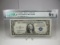 t-87 PMG Graded 64 Choice Unc 1935-C Silver 1 Dollar Certificate