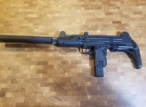 j-27 Israel IWI UZI 22lr semi auto pistol with folding stock.