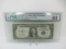 t-207 PMG Graded 64 Choice Unc 1935 No Motto $1 Silver Certificate