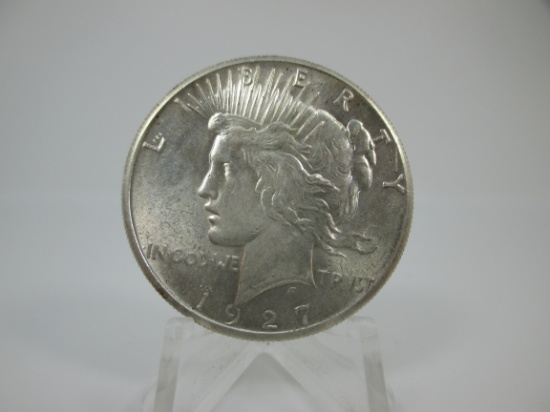 UNC 1927-P Peace Silver Dollar.