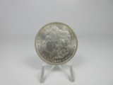 t-113 Gem BU 1883-0 Morgan Silver Dollar. Amazing details and vibrant luster.