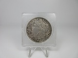 t-185 1886 Morgan Silver dollar in plastic air tight