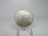 t-50 UNC 1925 Peace Silver Dollar. Great mint luster