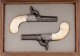 Matched Pair of 19th Century Engraved Ivory-Grip Belgian Percussion Muff Pistols