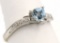 10K White Gold Trillion Cut Blue Topaz Ring