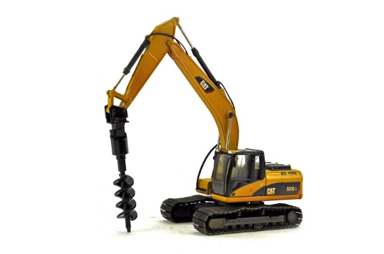 Caterpillar 320 Excavator w/Drill Attachment