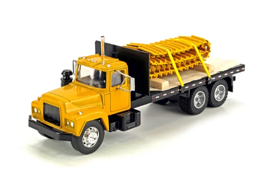 Mack Flatbed with Metal Track Load