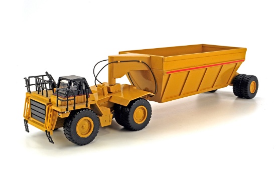 Caterpillar 777D w/Dump Trailer