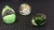 Group of 3 Green Design Glass Paperweights