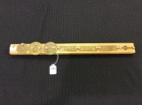 Small Board of 8 Mostly Brass Tags including