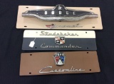 Collection of 3 Car Emblems on Plate including