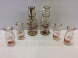 Group of Milk Bottles Including