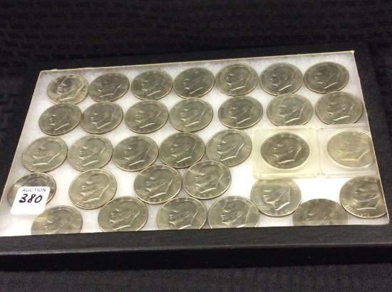 Collection of 32 Ike Dollars Including
