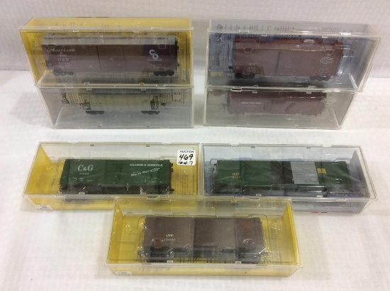 Lot of 7 HO Scale Stock Cars in Acrylic  Cases