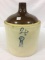 4 Gal Stoneware Jug Front Marked Blue