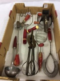 Group of Red Handled Kitchen Utensils