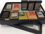 Lot of 7 Collectible Zippo Lighters Including