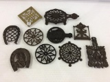 Lot of 10 Various Iron Trivets Including Train