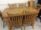 Oak Table w/ 3 Leaves & 6 Matching Chairs