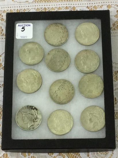 Collection of 11 Peace Silver Dollars Including