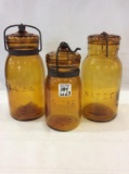 Lot of 3 Amber Glass Fruit Jars Including