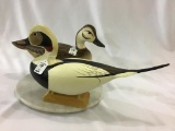 Pair of Hollow Carved Old Squaw Decoys by