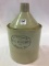 Adv. 1 Gal. Stoneware Jug Front Marked