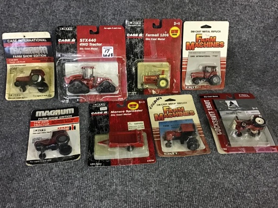 Lot of 8 Ertl Case 1/64 Scale Tractors in