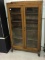 Sm. Oak Glass Doored Cabinet