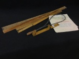 Group of Primitives Including Rug Beater,