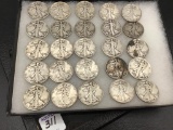 Collection of 25 Walking Liberty Half Dollars