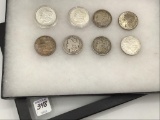 Collection of 8 Morgan Silver Dollars