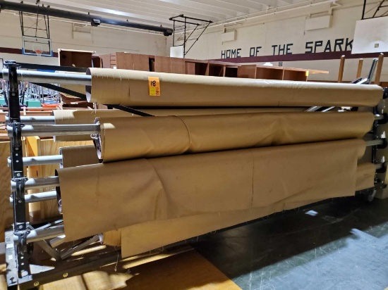 Rolling rack approx 12ft long Covermaster and gym floor covering material