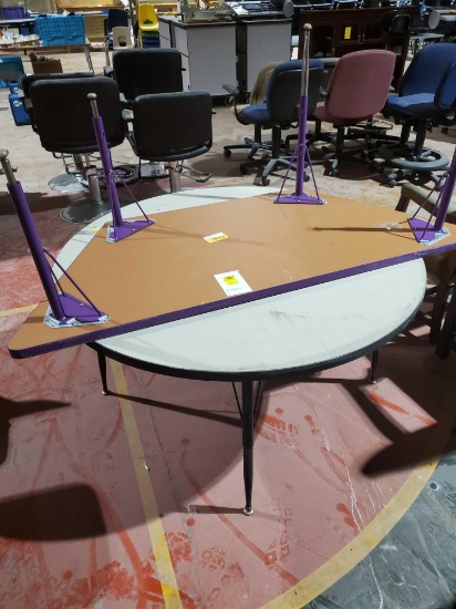 2 classroom tables. One circle one trapezoid