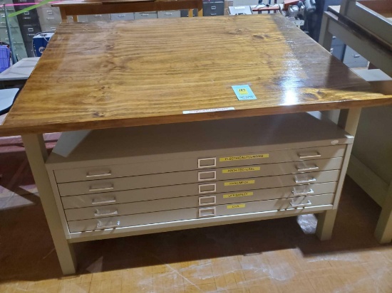 Drafting table and cabinet.