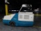 Tennant Gasoline Powered Rider Floor Machine Model 810, S/N 810-3066 (734 hours) (needs rear steer