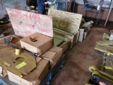 LOT: Assorted Parts including Volvo Windshield, Caterpillar Cutting Side Brushes, Plates, Radiators,