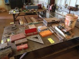 LOT: Contents on Table including Trowels, Squares, Hole Saws, Levels, Grease Zerks (no table or