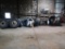 LOT: Assorted Tires and Wheels on North Wall w/Tire Rack