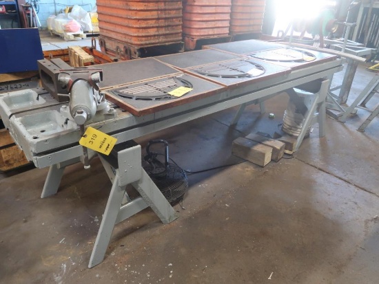 LOT: (1) 28 in. x 112 in. T-Slot Machine Table on (2) Steel Horses, with 6 in. Machine Vise