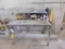 LOT: 62 in. x 36 in. x 48 in. Steel Work Table, with Contents of Clamps, Tape Measures, Squares,