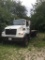 1999 Sterling Flatbed Truck, 24 ft. Bed (est.) Tandem Axle, CAT Diesel, Moffit Mount, VIN