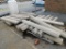 LOT: Contents of Outside Cage: (1) Section of Teardrop Pallet Racking, Assorted Wood, Metal Tubes,