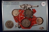 Unusual piece, was handed out as a sales award. Contains 2 1968-d 50C, a 1899-o Morgan Silver