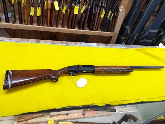 Remington Model 1100 Trap, 12 Ga. 2-3/4", two extra barrels - Note: Heavy Rust Spot on Barrel