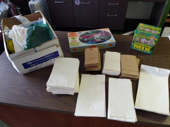 Paper, plastic bags, puzzle, stepping stone mix