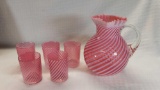 Cranberry Swirl Pitcher & 5 Glasses (4 with several chips)