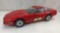 1984 RED CORVETTE BEAM DECANTER HAS CRACKED WINDOW FULL WITH BOX