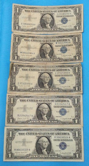 FIVE 1957A ONE DOLLAR SILVER CERTIFICATES